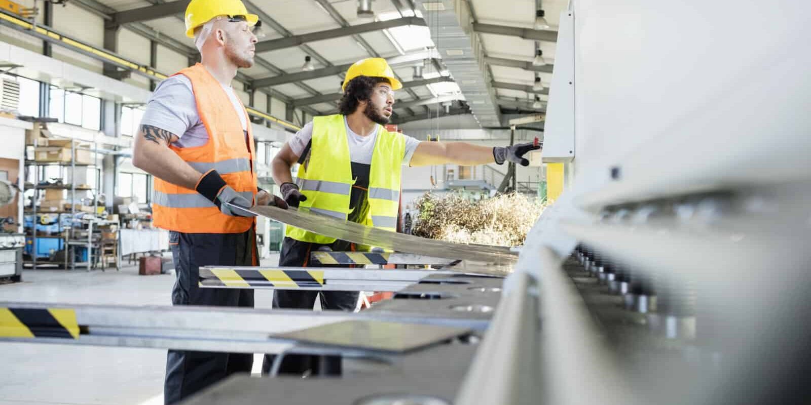 Male manual workers manufacturing sheet metal at industry Male manual workers manufacturing sheet metal at industry - Extrapolating Airborne Contaminant Results to Longer Shifts