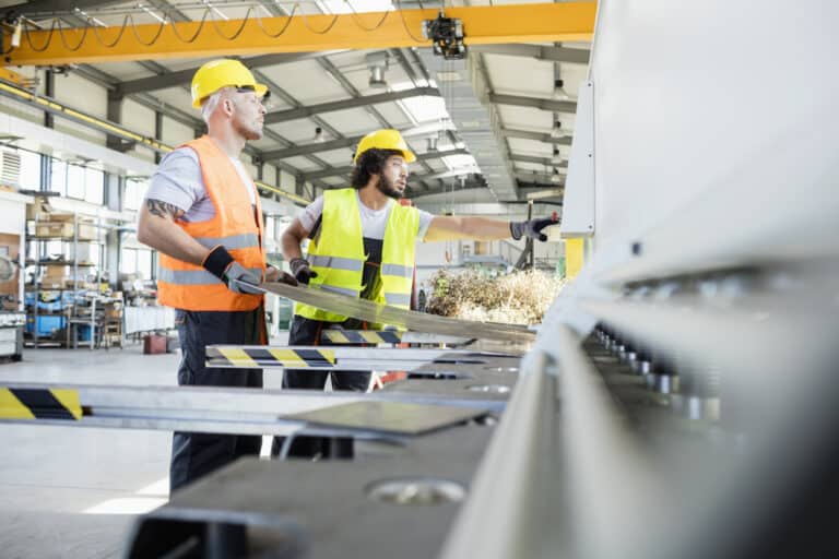 Male manual workers manufacturing sheet metal at industry Male manual workers manufacturing sheet metal at industry - Extrapolating Airborne Contaminant Results to Longer Shifts